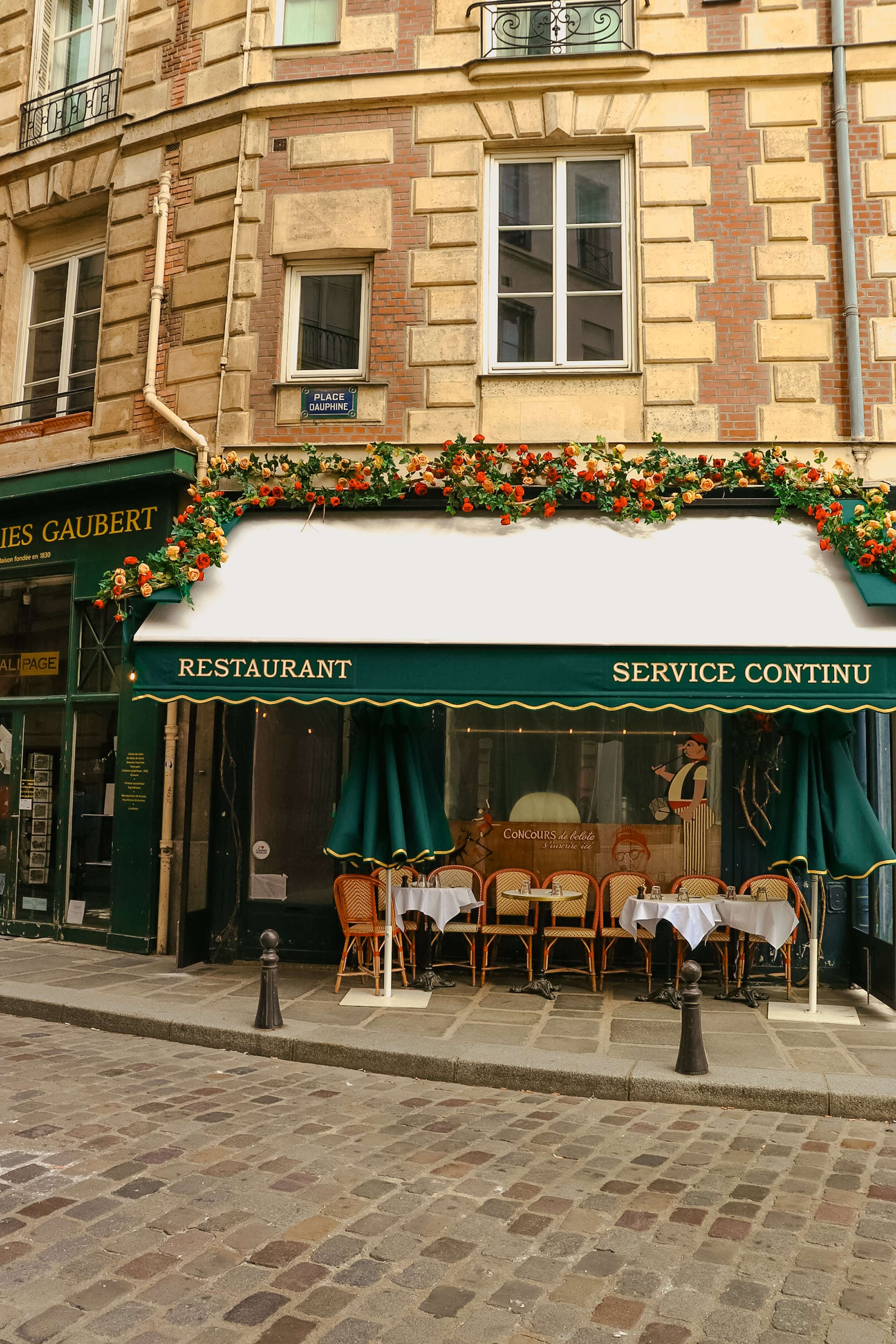 A restaurant with street seating